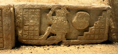 Low relief of a ball game player, the ball, and the glyphs giving a description, late Classic Period (700-900 AD) by Mayan